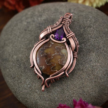 Load image into Gallery viewer, Sutured Ammonite with Faceted Amethyst
