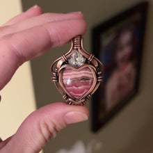 Load and play video in Gallery viewer, Rhodochrosite Heart with Faceted Quartz
